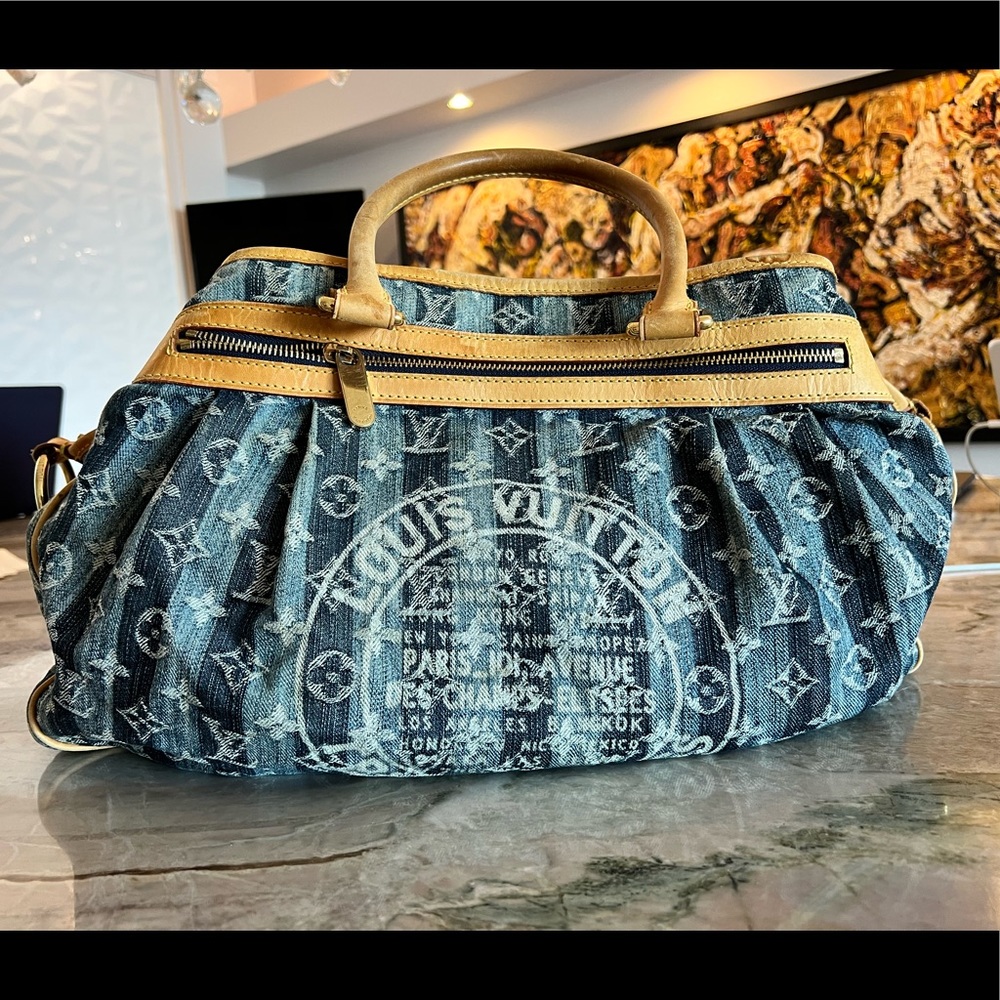 Definitely used Louis Vuitton tote bag